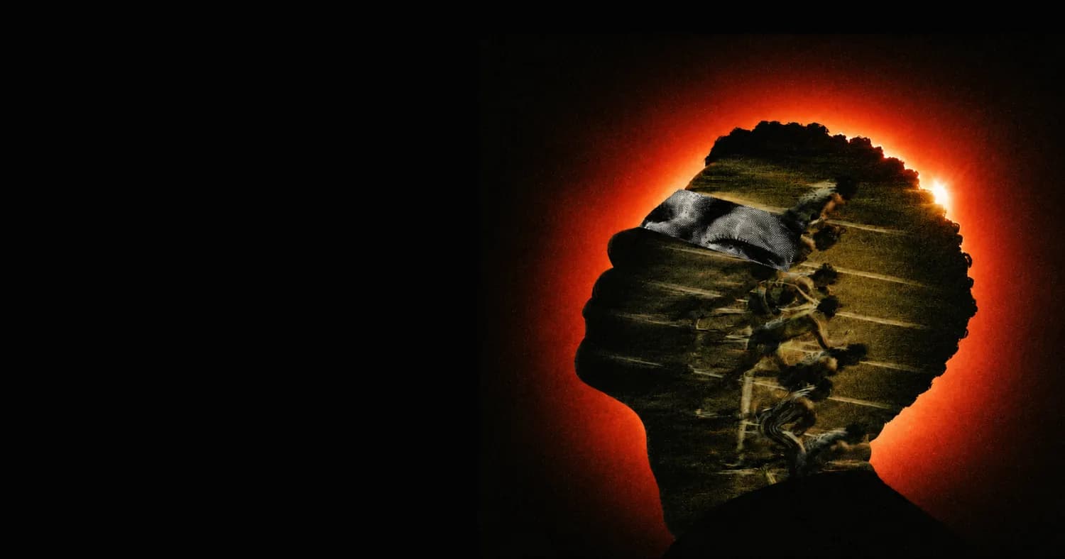 A silhouette dissolving into stone against an eclipse of light