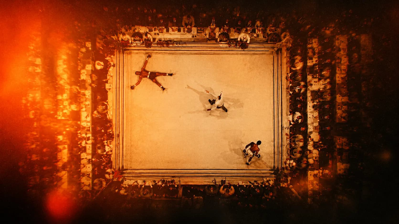A fighter at rest in the ring under warm light